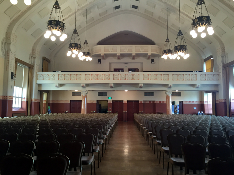 Colour photograph of the main hall, showing the view from the stage.